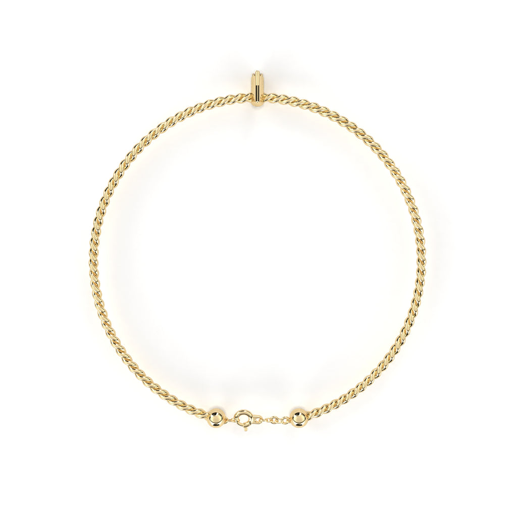 Simple rope-style gold bracelet with marquise diamond
