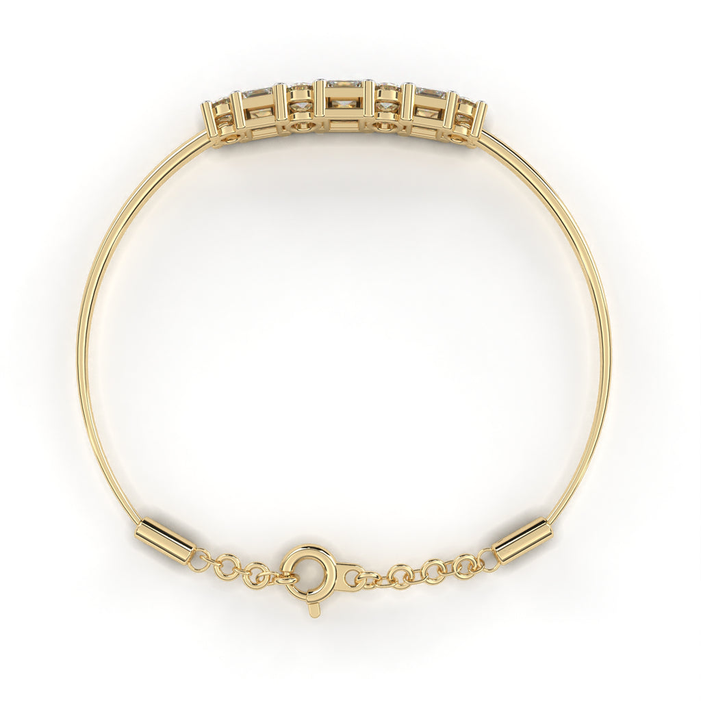 Gold bracelet with round diamonds and princess cut diamonds