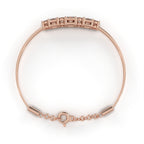 Rose Gold bracelet with round diamonds and princess cut diamonds