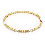 Gold hexagon-shaped diamond tennis bracelet