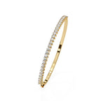 Luxury gold tennis bracelet with round diamonds