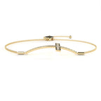 Gold bracelet with a diamond cross