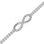 Dainty infinity pattern diamond bracelet in white gold