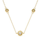 Sunlit bezel-set round diamond pendant in gold