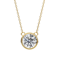 Round solitaire diamond pendant in gold