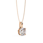 Round diamond solitaire pendant in 4-prong rose gold setting