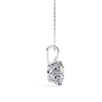 Side view of white gold diamond pendant with vintage filigree pattern