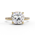 Cushion cut diamond engagement ring with pavé band in gold