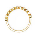 Geometric bezel-set diamond wedding band design