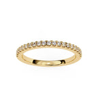 Dainty yellow gold diamond band with sparkling pave diamonds
