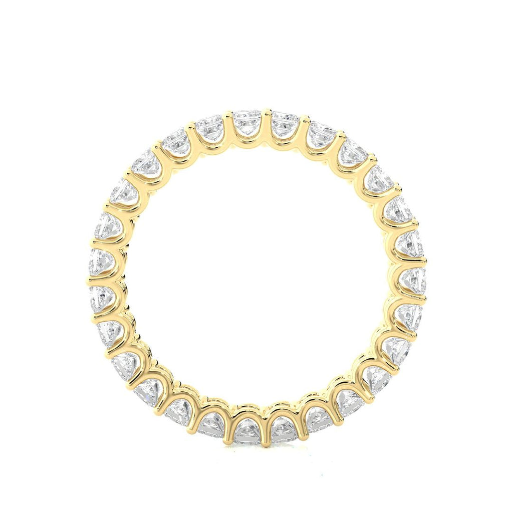 Gold wedding band with diamond on a white background