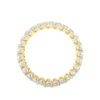 Gold wedding band with diamond on a white background