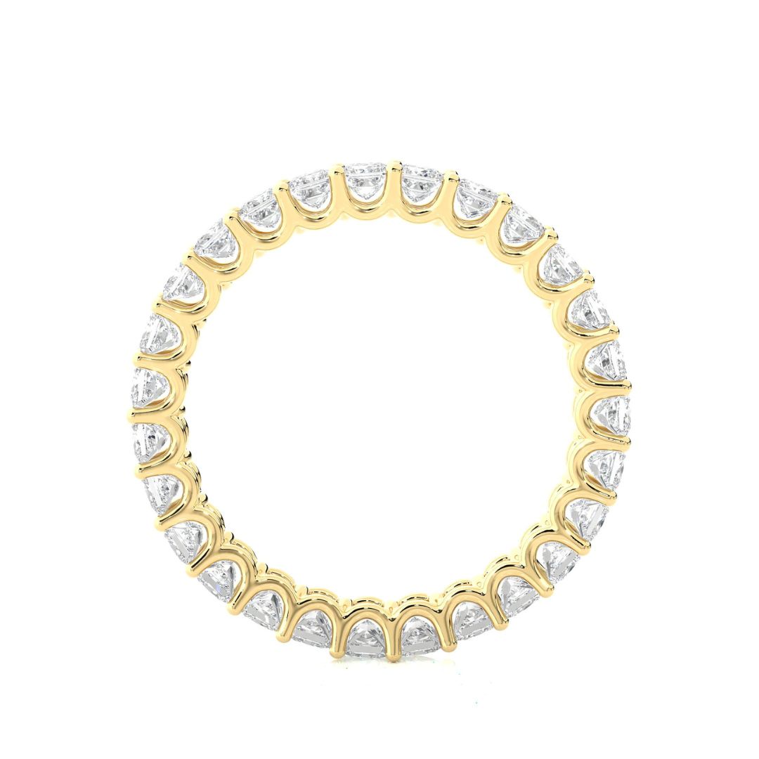 Gold wedding band with diamond on a white background