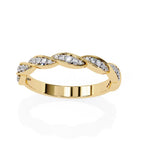 Gold wedding band on a white background