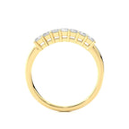 Gold wedding band for woman on a white background