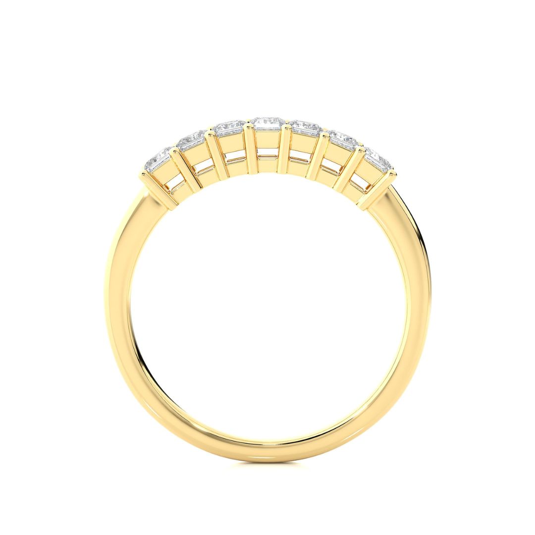Gold wedding band for woman on a white background