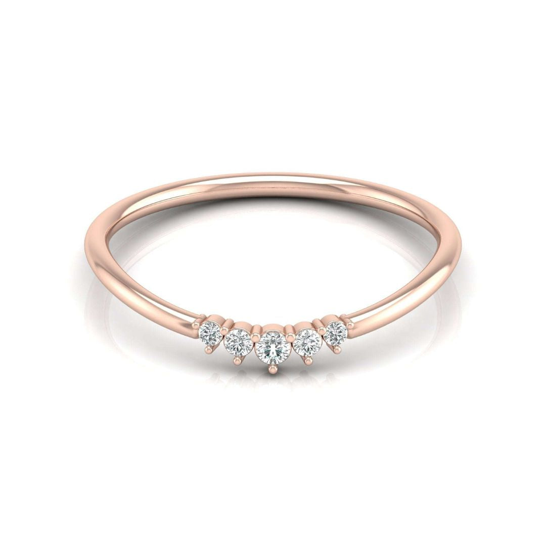 Dainty five-diamond wedding ring in rose gold