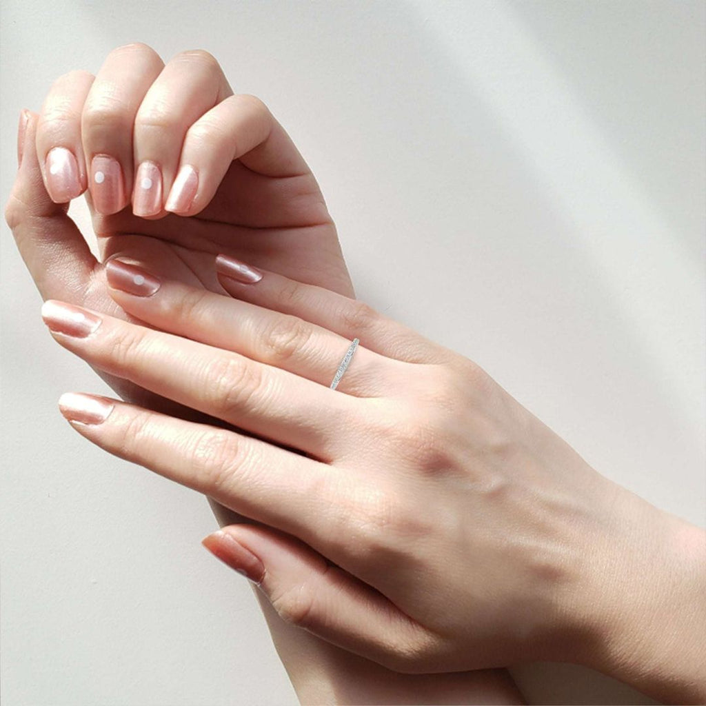 Woman wearing diamond wedding band