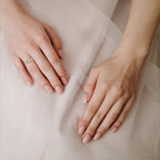Woman wearing Grand Solitaire Diamond Engagement Ring