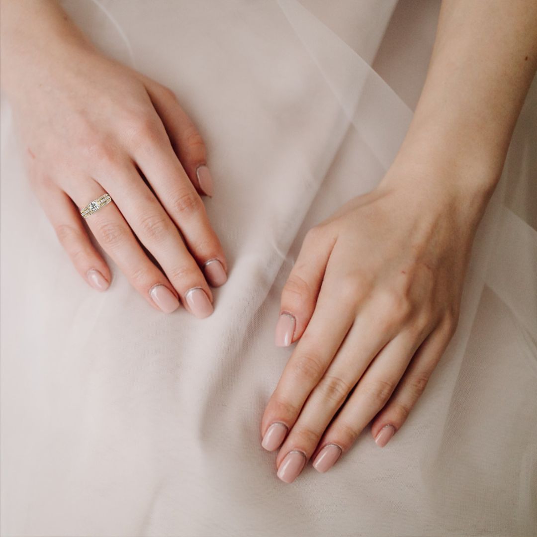 Woman wearing Grand Solitaire Diamond Engagement Ring