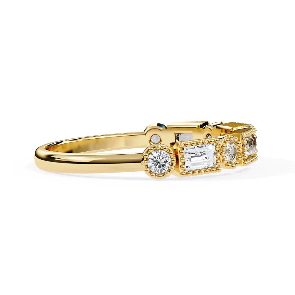 Gold wedding band with diamonds on a white background