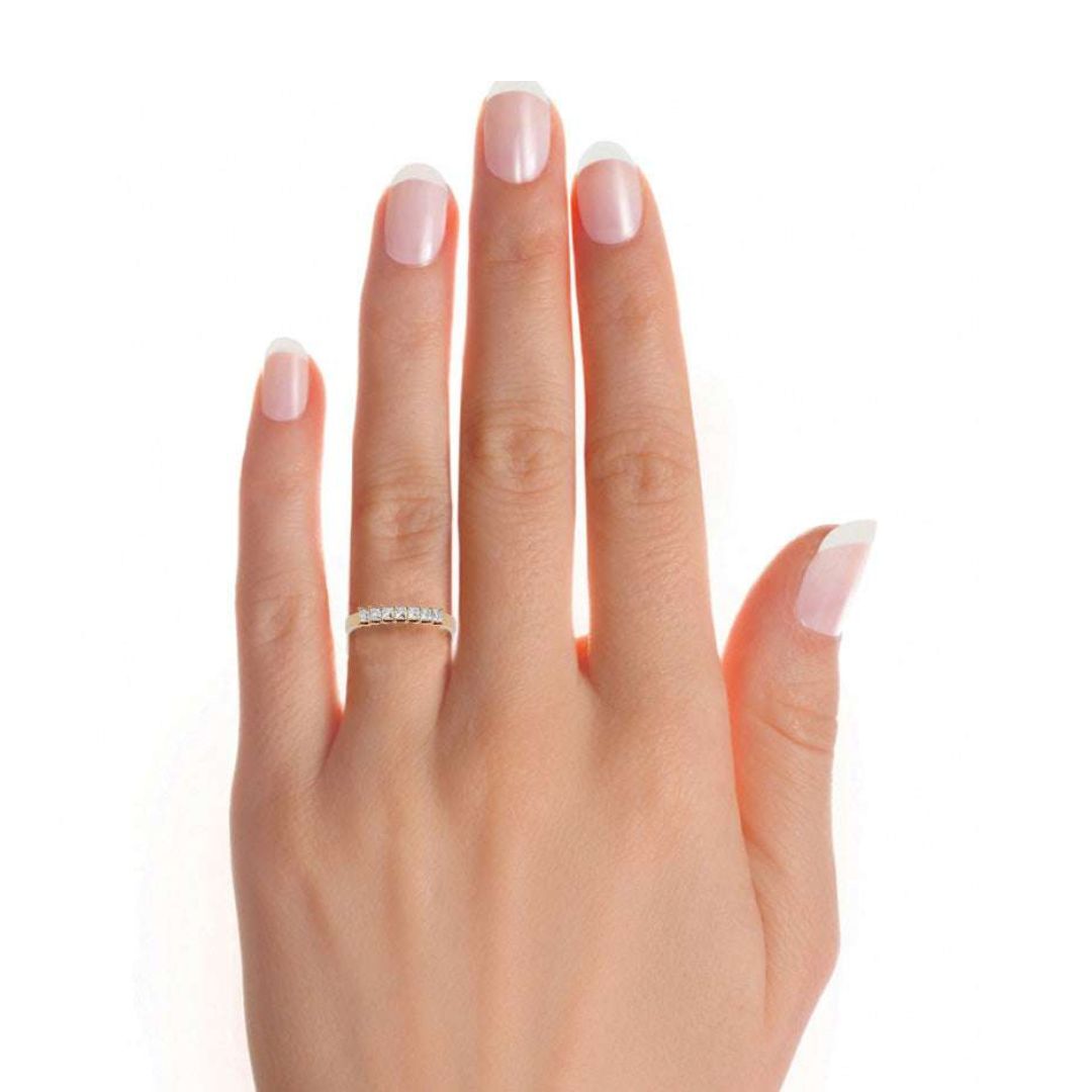 Woman wearing a diamond wedding band