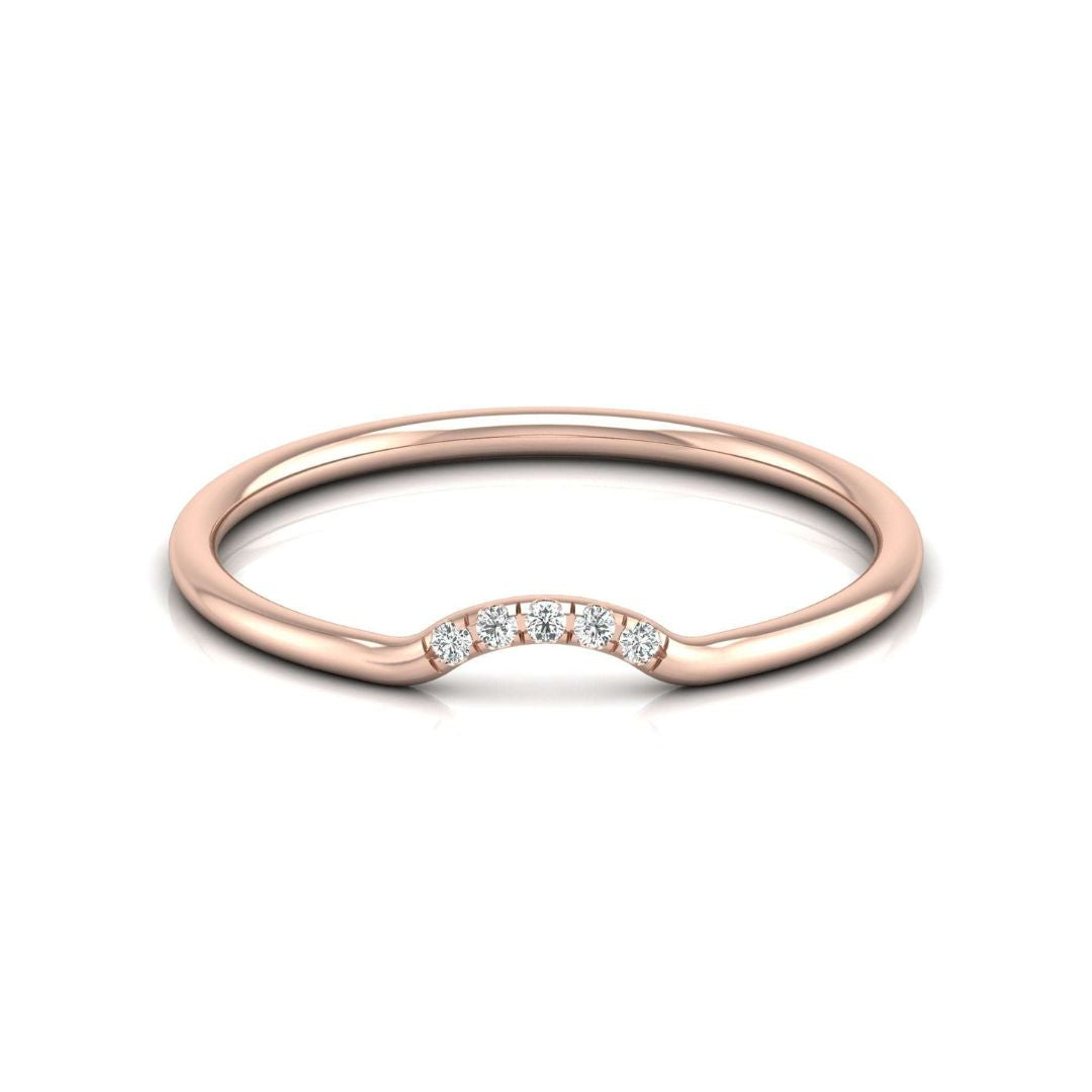 Affordable Rose Gold ring with small diamonds on a white background