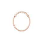 Rose Gold wedding ring with small diamonds on a white background