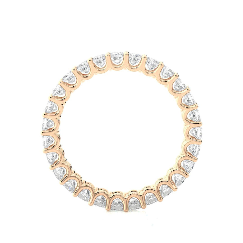 Rose Gold wedding band with diamond on a white background