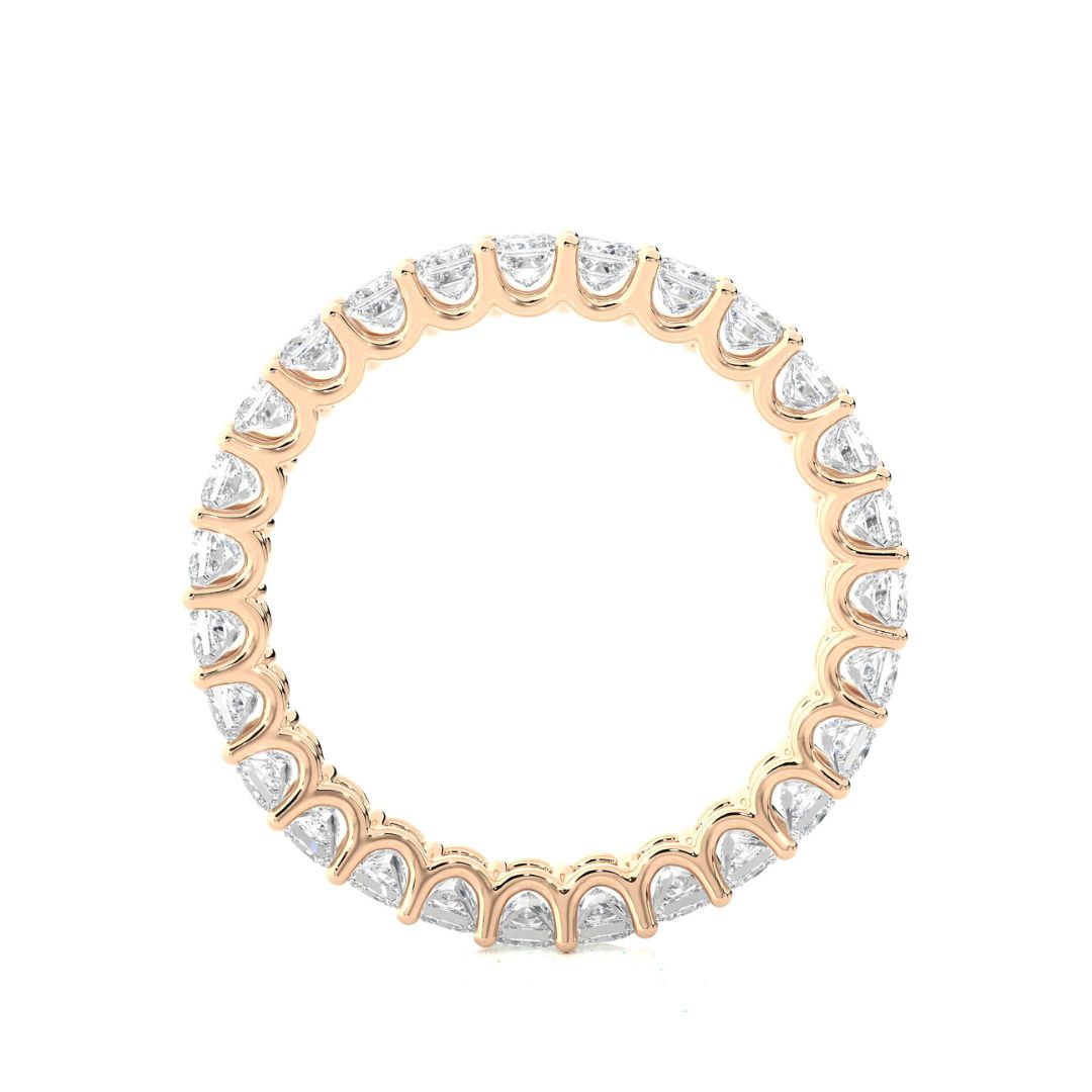 Rose Gold wedding band with diamond on a white background