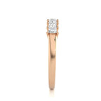 Rose Gold wedding ring with diamonds on a white background