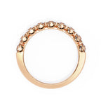 Fine rose gold diamond band with round stones