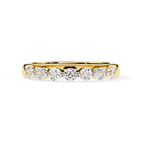 Round cut diamond wedding band in yellow gold