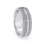Diamond-studded wedding band with layered white gold pattern