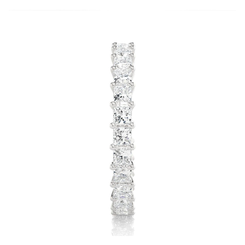 White Gold wedding band with diamond on a white background