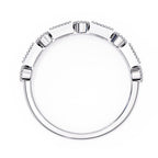 White gold wedding band on a white background