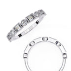 Two diamond wedding bands on a white background