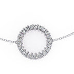 Dainty women’s white gold bracelet with halo diamond circle design