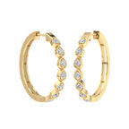 Classic gold hoop earrings with pear cut diamonds