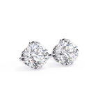 Round cut diamond stud earrings in White Gold