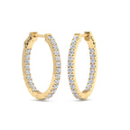 Gold diamond huggies with round hoop shape
