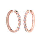 Classic rose gold hoop earrings with pear cut diamonds