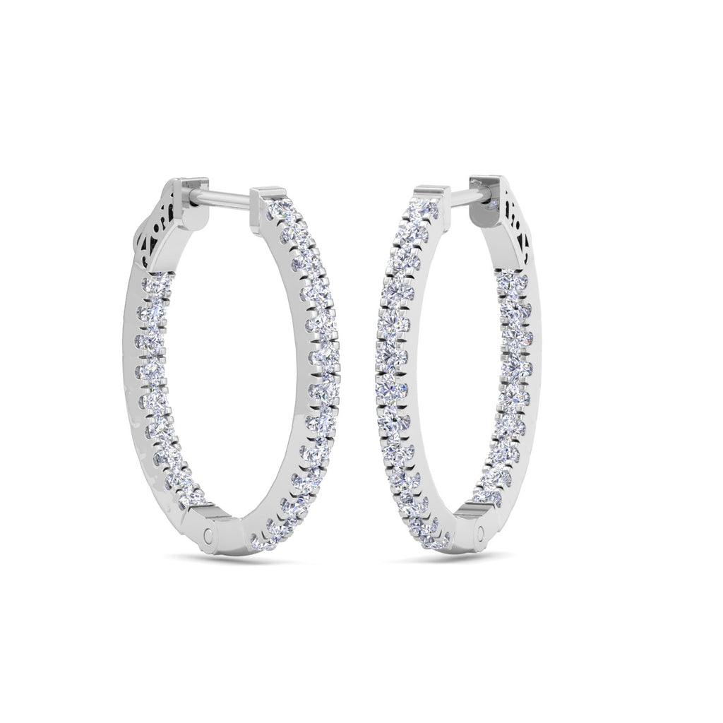 White Gold diamond huggies with round hoop shape