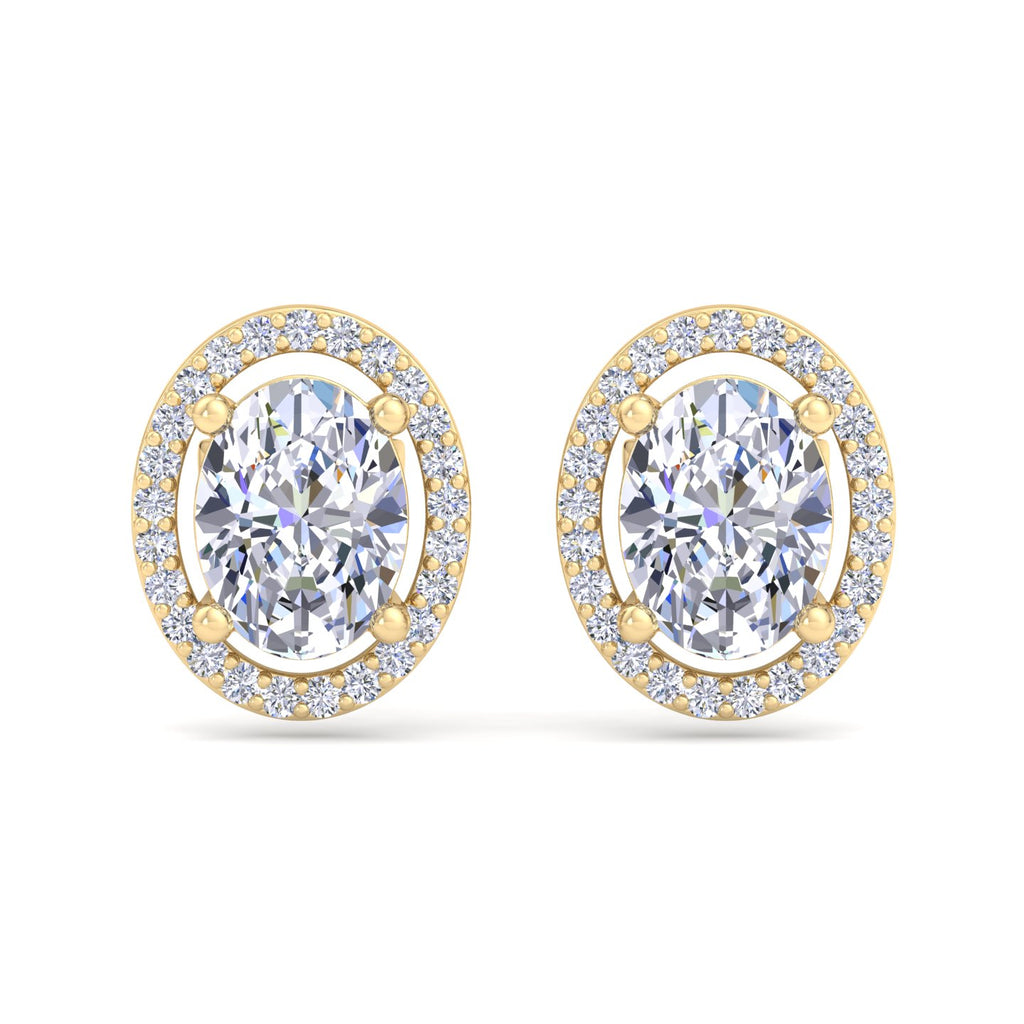 Gold oval-shaped diamond stud earrings