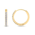 Gold diamond hoop earrings with pavé setting