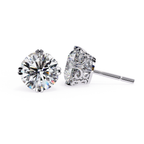 Round cut diamond stud earrings in White Gold