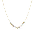 Gold necklace with diamonds on a white background