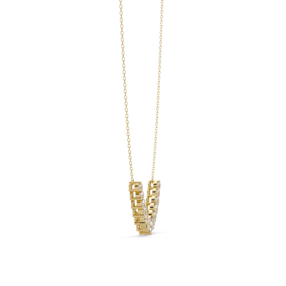 Gold necklace with a geometric pendant on a white background