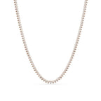 Pear Shape Diamond and gold necklace on a white background