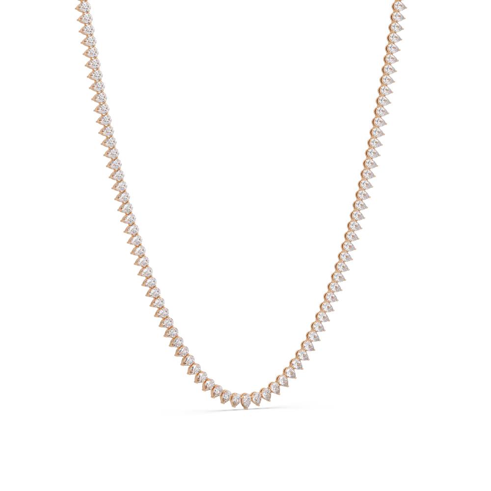 Pear Diamond and gold necklace on a white background
